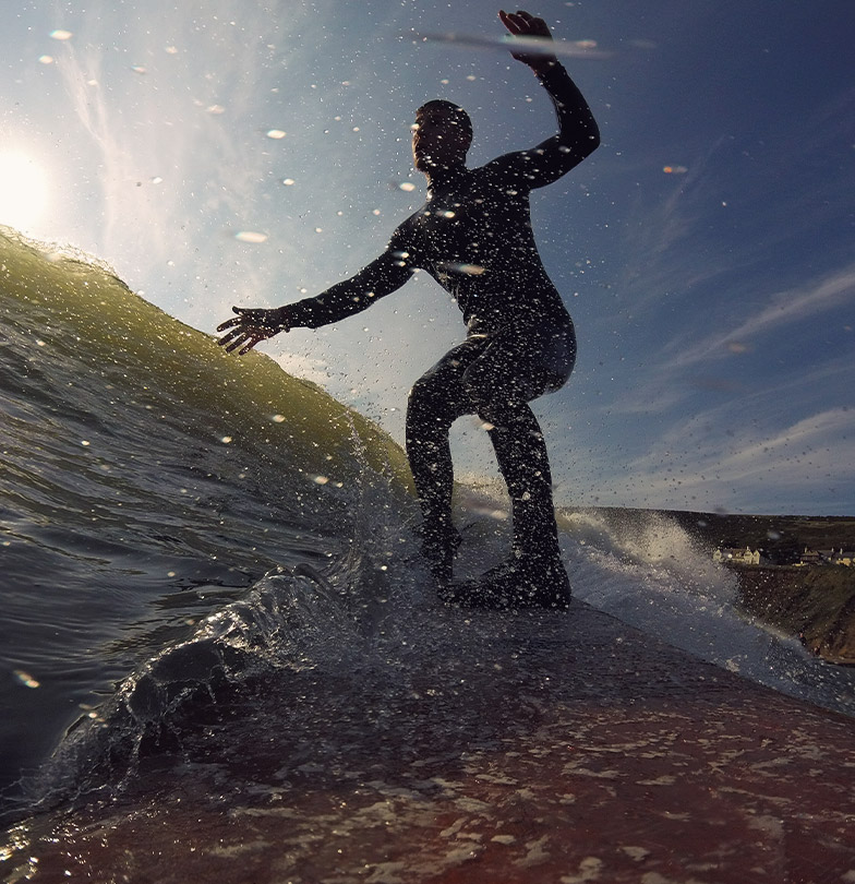 Sam Pilgrim surfing