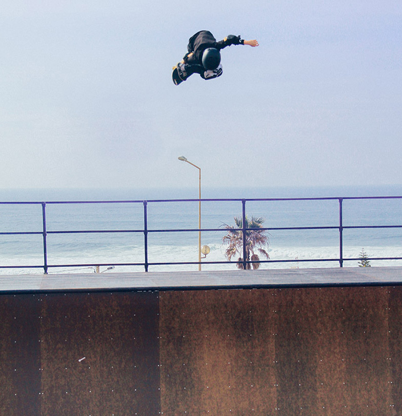 vert skateboarder ripping high